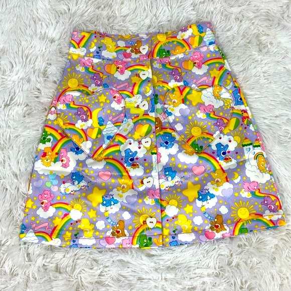 Unique Vintage Dresses & Skirts - UNIQUE VINTAGE x Care Bears Rainbow Print Mini Skirt Heart Pockets White XS